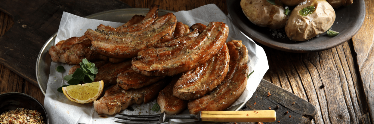 Provil Χοιρινά μπριζολάκια με πατάτες wedges