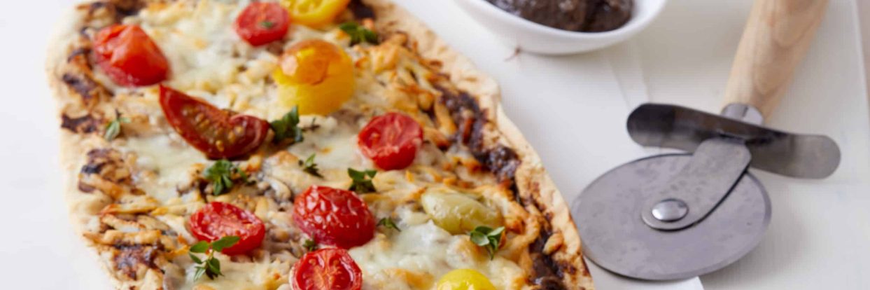 Πίτσα με τρούφα και τοματίνια